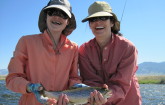 Mother and daughter enjoying a day on the river.